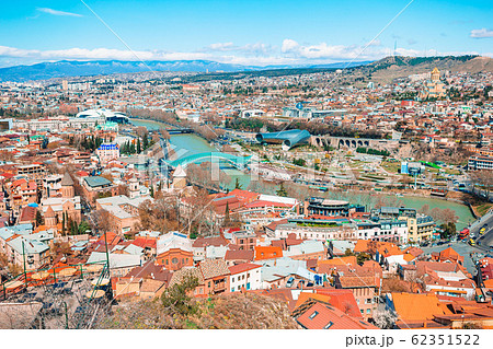 Tbilisi city panorama. Old city, new Summer Rike park, river Kura, the European Square and the Bridge of Peace Tbilisi city panorama. Old city, new Summer Rike park, river Kura, the European Square and the Bridge of Peace 62351522