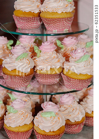 Beautiful fresh cakes on the festive table. Beautiful fresh cakes on the festive table. 62351533