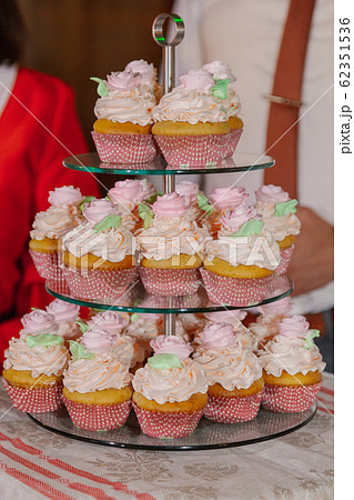 Beautiful fresh cakes on the festive table. Beautiful fresh cakes on the festive table. 62351536