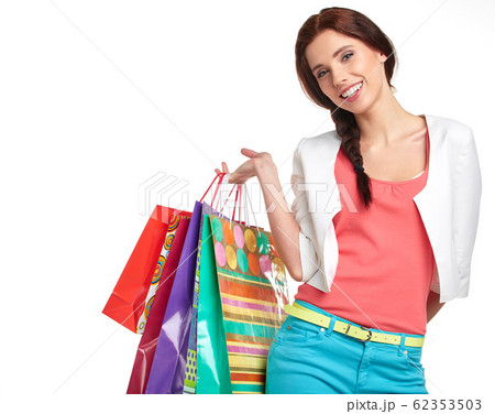Shopping woman holding bags, isolated on white 62353503