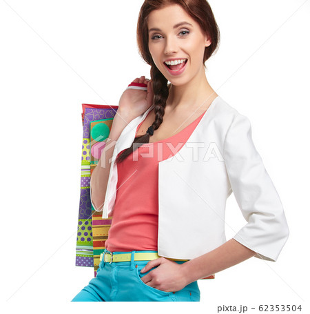 Shopping woman holding bags, isolated on white 62353504