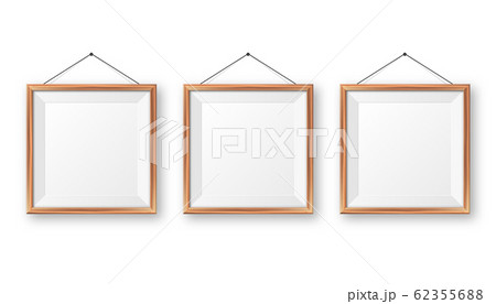 Realistic hanging on a wall blank wooden picture frame. Modern poster mockup. Empty photo frame with 62355688