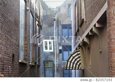 Old small vintage street with an awning Old small vintage street with an awning 62357143
