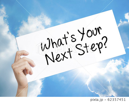 What's Your Next Step? Sign on white paper. Man 62357451