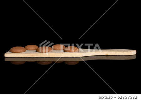 Chocolate sponge biscuit isolated on black glass 62357532