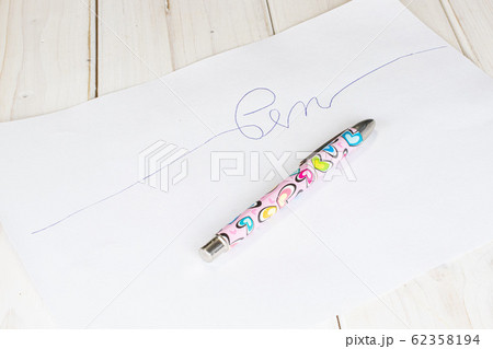 Ballpoint writing pen on grey wood Ballpoint writing pen on grey wood 62358194