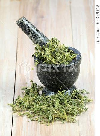 Dried Tribulus terrestris in the mortar 62359352