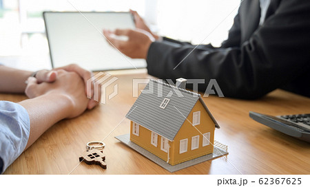 Close up view of House loan agent using blank Close up view of House loan agent using blank 62367625