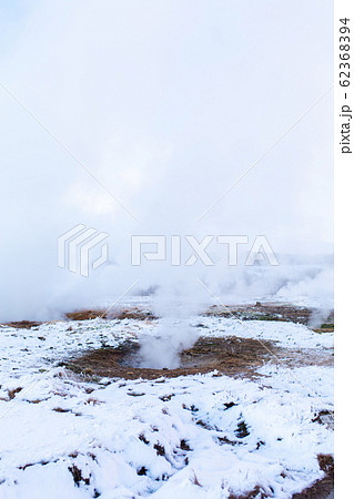 An erupting soaring geyser in the Valley of An erupting soaring geyser in the Valley of 62368394