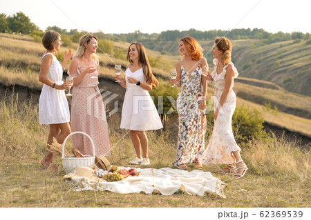 The company of gorgeous female friends having fun The company of gorgeous female friends having fun 62369539