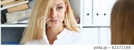 Young couple trying to get loan at bank clerk consultant 62372198