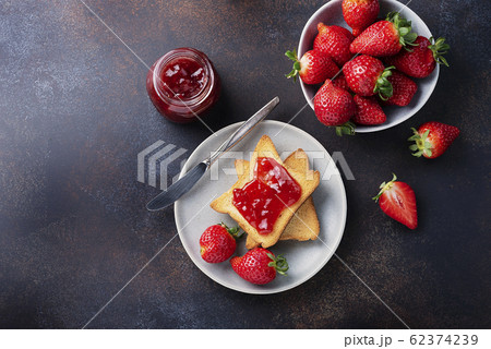 Toasts with strawberry jam Toasts with strawberry jam 62374239