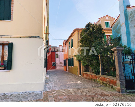 BURANO, ITALY - JANUARY 20, 2020: Colorful houses on the island of Burano in Italy. Burano island is famous for its colorful fisherman's houses. 62376216