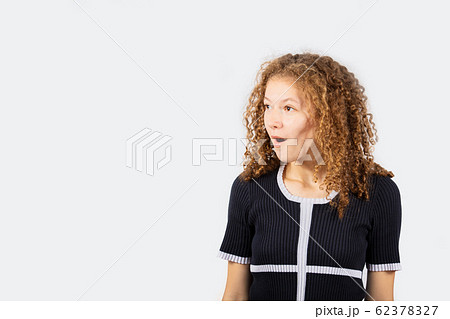 Shocked young girl 62378327