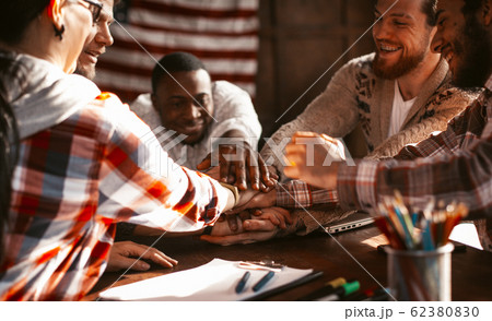 Highfive Of Diverse Multiracial Startup Team On American Flag Background 62380830