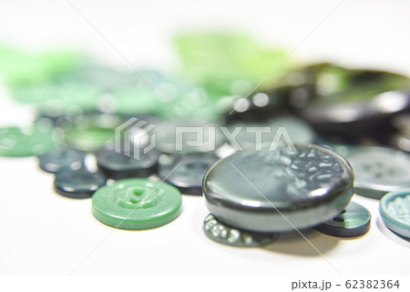 Green buttons of different shape and size on the Green buttons of different shape and size on the 62382364