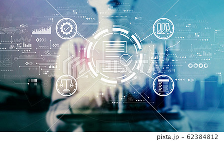 Compliance concept with businesswoman using a tablet Compliance concept with businesswoman using a tablet 62384812