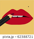 Pencil lipstick paints beautiful red lips. 62388721