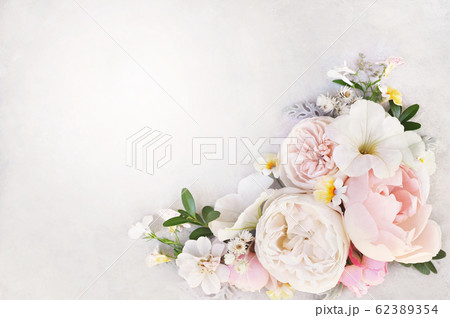 Delicate blossoming roses and blooming flowers festive background, pastel and soft bouquet floral card, selective focus, toned 62389354