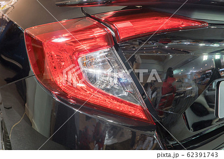 Detail on the rear light of a black. black sport Detail on the rear light of a black. black sport 62391743