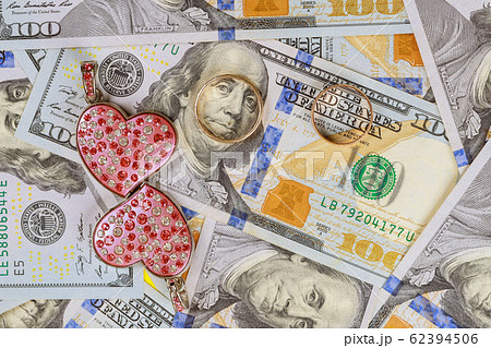 Heart diamonds and wedding ring on american 62394506