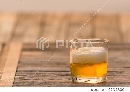 Beer in a glass with evening light.3 Beer in a glass with evening light.3 62398004