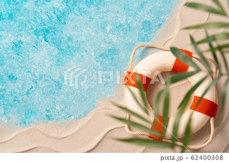 Creative layout of sand waves and sea, summer beach background with shell, sea star, compass life Creative layout of sand waves and sea, summer beach background with shell, sea star, compass life 62400308