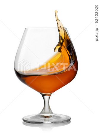 splash of brandy in snifter glass 62402020