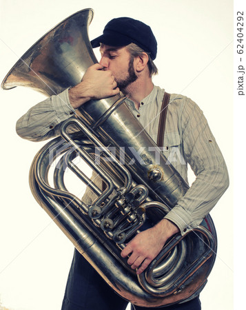 loving man with suspenders and cap tube kisses 62404292