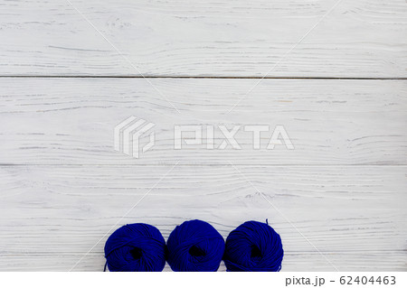 Background with knitting classical blue skein yarn Background with knitting classical blue skein yarn 62404463