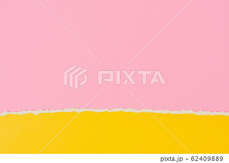 Torn ripped paper edge with a copy space, pink and 62409889