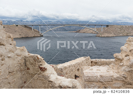 Island of Pag old desert ruins and bridge panorama view, Dalmatia, Croatia Island of Pag old desert ruins and bridge panorama view, Dalmatia, Croatia 62410836