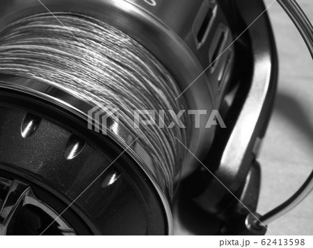 Spinning reel in the background of various - Stock Photo [72840856] -  PIXTA