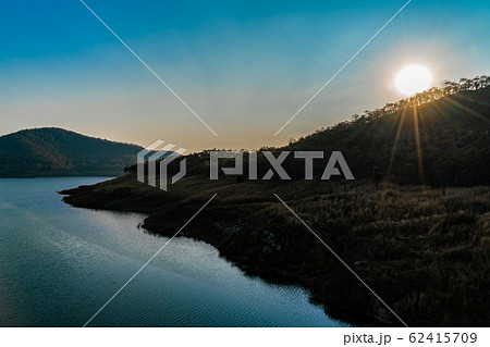 Scenery lake and mountain with sunset for holiday 62415709