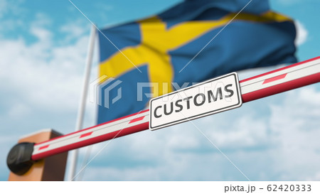 Closing boom barrier with CUSTOMS sign against the Swedish flag. Restricted border crossing or protective tariffs in Sweden. 3D rendering 62420333