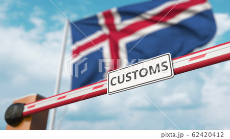Closed boom gate with CUSTOMS sign on the Icelandic flag background. Border closure or protective tariffs in Iceland. 3D rendering 62420412