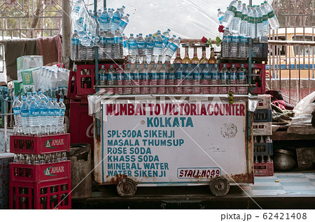 food stall display with soda water, soft drinks and water bottles in a roadside eatery food stall display with soda water, soft drinks and water bottles in a roadside eatery 62421408