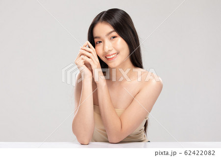 Young Asian Woman Holding Hands smile 62422082