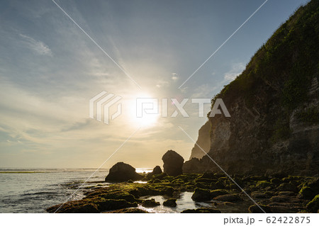 Cliff on coast under sun stock photo Cliff on coast under sun stock photo 62422875