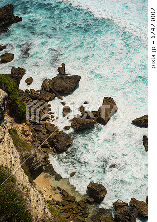 Beautiful landscape of waves breaking against rocky shore Beautiful landscape of waves breaking against rocky shore 62423002