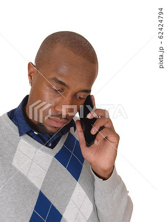 Close-up image of an African man on his cellphone 62424794
