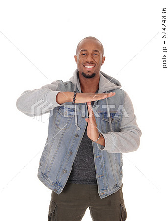 Young African man giving a sign to talk Young African man giving a sign to talk 62424836