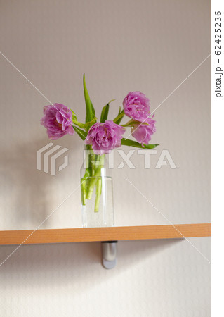 Spring tulips on the table at the daylight. 62425236