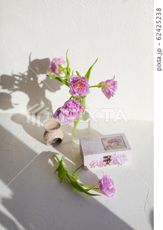 Spring tulips on the table at the daylight. 62425238
