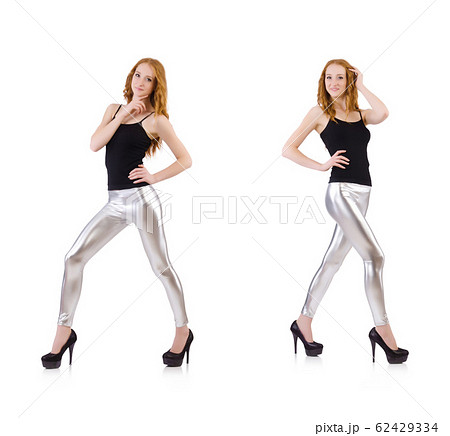 Young redhead girl in tight leggings 62429334