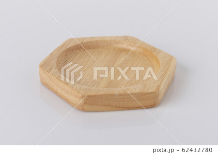 Hexagon shaped wooden tray on a white background 62432780