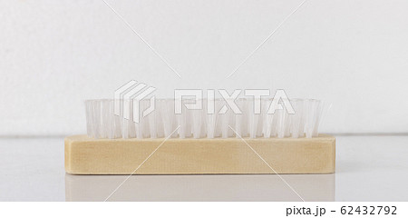 Clothes cleaning brush isolated on white Clothes cleaning brush isolated on white 62432792
