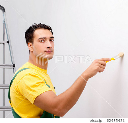 Construction worker working at the site 62435421