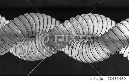 Spiral of duct pipes, industrial ventilation photo Spiral of duct pipes, industrial ventilation photo 62435480