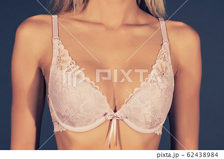 Premium Photo  Close-up of a female breast in lace underwear. bra